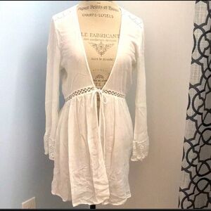 White long sleeve swimsuit cover up.